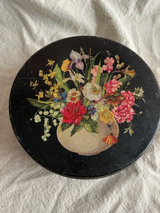Vintage black tin with florals